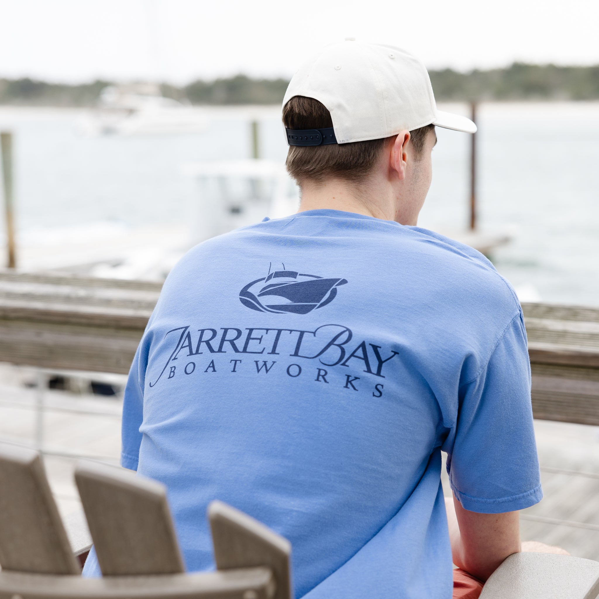 Man models a Jarrett Bay Classic Logo Flo Blue T-Shirt