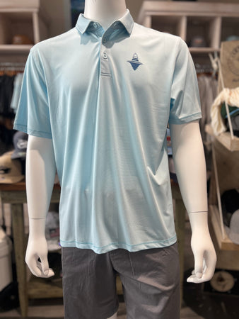 Light blue polo shirt on a mannequin with a blurred indoor background